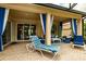 Spacious covered patio perfect for lounging by the pool at 16213 Diamond Bay Dr, Wimauma, FL 33598