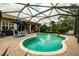 Enjoy this relaxing screened pool and patio entertaining area at 16213 Diamond Bay Dr, Wimauma, FL 33598