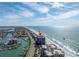 Aerial perspective showcasing beachfront condo and coastal views at 1660 Gulf Blvd # 304, Clearwater Beach, FL 33767