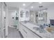 Modern bathroom with double vanity and marble countertop at 1660 Gulf Blvd # 304, Clearwater Beach, FL 33767