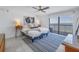 Spacious main bedroom with ocean view and ceiling fan at 1660 Gulf Blvd # 304, Clearwater Beach, FL 33767