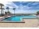 Inviting pool area with ocean views and ample lounge space at 1660 Gulf Blvd # 304, Clearwater Beach, FL 33767