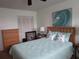 Bedroom with a king-size bed and built-in shelving at 1900 59Th N Ave # 212, St Petersburg, FL 33714