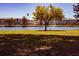 Serene lake view with lush landscaping and fountain at 1900 59Th N Ave # 212, St Petersburg, FL 33714