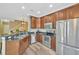 Modern kitchen with a breakfast bar and double sink at 2104 Park Crescent Drive, Land O Lakes, FL 34639