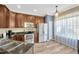 Modern kitchen with stainless steel appliances and granite countertops at 2104 Park Crescent Drive, Land O Lakes, FL 34639