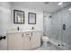 Modern bathroom with double vanity and walk-in shower at 2318 Granada W Cir, St Petersburg, FL 33712