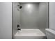 Simple bathroom with grey tile and shower/tub combo at 2318 Granada W Cir, St Petersburg, FL 33712