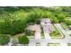 Aerial view of two houses with green surroundings at 2512 Centennial Falcon Dr, Valrico, FL 33596