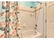 Clean bathroom with shower and starfish-themed decor at 2512 Centennial Falcon Dr, Valrico, FL 33596