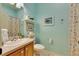 Charming bathroom with a shower/tub combo and coastal decor at 2512 Centennial Falcon Dr, Valrico, FL 33596