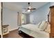 Bedroom with wood flooring and ceiling fan at 2512 Centennial Falcon Dr, Valrico, FL 33596