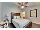 Cozy bedroom featuring a double bed and access to a sunroom at 2512 Centennial Falcon Dr, Valrico, FL 33596