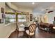 Cozy breakfast nook with a glass table and wicker chairs, overlooking the pool at 2512 Centennial Falcon Dr, Valrico, FL 33596