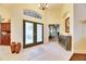 Elegant foyer featuring double doors and hardwood floors at 2512 Centennial Falcon Dr, Valrico, FL 33596