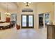 Bright and spacious foyer with a view of the dining room and living area at 2512 Centennial Falcon Dr, Valrico, FL 33596