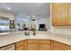 Modern kitchen features corian countertops and stainless steel appliances at 2512 Centennial Falcon Dr, Valrico, FL 33596