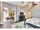 Main bedroom with sliding doors to the patio and a view of the pool at 2512 Centennial Falcon Dr, Valrico, FL 33596