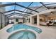 Inviting pool and spa with a covered patio at 2512 Centennial Falcon Dr, Valrico, FL 33596