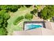 Aerial view of a large, screened-in swimming pool at 2512 Centennial Falcon Dr, Valrico, FL 33596