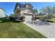 Two-story house exterior with a double-car garage at 2670 Tarragona Way, Wesley Chapel, FL 33543