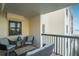 Relaxing balcony with outdoor seating and ocean views at 3200 Gulf Blvd # 204, St Pete Beach, FL 33706