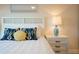 Bright bedroom with a comfortable bed and stylish decor at 3200 Gulf Blvd # 204, St Pete Beach, FL 33706