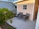 Private patio with seating, great for morning coffee at 34091 Alamanda N Dr, Pinellas Park, FL 33781