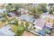 Aerial view of the house, showing its backyard and neighboring houses at 3709 W Oklahoma Ave, Tampa, FL 33611