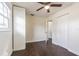 Spacious bedroom with hardwood floors and double door closet at 3709 W Oklahoma Ave, Tampa, FL 33611