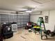 Attached garage with storage and a stepladder at 3830 Stornoway Dr, Land O Lakes, FL 34638