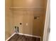 Laundry room with wire shelving and tile floor at 3830 Stornoway Dr, Land O Lakes, FL 34638