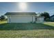 House exterior with carport and lawn at 4173 Driver Ln, Port Charlotte, FL 33981