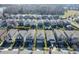 Aerial view of two-story house with backyard and solar panels at 4456 Tubular Run, Land O Lakes, FL 34638