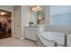 Bathroom with walk-in shower and spacious vanity at 4456 Tubular Run, Land O Lakes, FL 34638