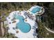 Resort-style community pool with leisure and lap pools at 4456 Tubular Run, Land O Lakes, FL 34638