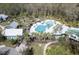 Resort-style community pool with multiple pools and a playground at 4456 Tubular Run, Land O Lakes, FL 34638