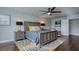 Main bedroom featuring a king-size bed and calming decor at 4456 Tubular Run, Land O Lakes, FL 34638