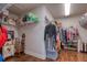 Spacious walk-in closet with ample shelving and hanging space at 4456 Tubular Run, Land O Lakes, FL 34638