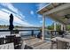 Enjoy the view from this waterfront deck with seating and shade at 4456 Tubular Run, Land O Lakes, FL 34638