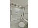 Updated bathroom with a walk-in shower and hexagon tile floor at 450 S Gulfview Blvd # 408, Clearwater Beach, FL 33767