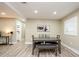 Simple dining room with gray table, bench, and four chairs at 4520 N Matanzas Ave, Tampa, FL 33614