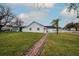 Brick pathway leads to the home's side yard at 4520 N Matanzas Ave, Tampa, FL 33614