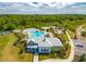 Community pool, playground, and clubhouse at 5027 Autumn Ridge Dr, Wesley Chapel, FL 33545