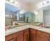 Bathroom with double vanity and granite countertops at 5027 Autumn Ridge Dr, Wesley Chapel, FL 33545