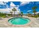 Community hot tub with surrounding lounge chairs at 5027 Autumn Ridge Dr, Wesley Chapel, FL 33545