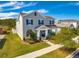 Two-story house, gray siding, blue shutters at 5027 Autumn Ridge Dr, Wesley Chapel, FL 33545