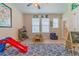 Playroom with toys, learning tools and a colorful rug at 5027 Autumn Ridge Dr, Wesley Chapel, FL 33545