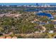 Aerial view of property showcasing location near water and city skyline at 5027 Sunrise S Dr, St Petersburg, FL 33705