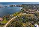 Wide aerial showcasing waterfront location and property at 5027 Sunrise S Dr, St Petersburg, FL 33705